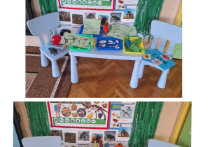 Na zdjęciu jest kącik dinozaura w sali, w którym znajdują figurki dinozaurów, skamieniałości kości dinozaurów przygotowane z masy solnej, zdjęcia, książki i albumy o dinozaurach.