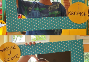 Na zdjęciu dwoje dzieci pozujących w niebieskiej ramce w kropki z napisem :Wierzę w siebie.. i kropka!"