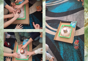 Na zdjęciu dzieci oglądają eksperyment na temat wybuchu wulkanu.